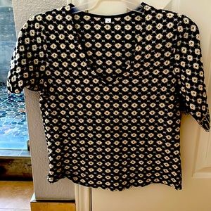 Women’s v-neck black with white flowers top